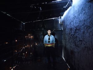 Teenager devotee of Gauchito Gil in the praying room of temple of the popular saint in El Campito de la Carolina