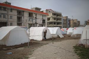 People are camping beside their homes