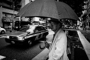 A man waits for bus in Shinjuku