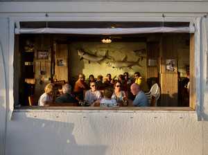 USA. Florida. 2015. People eating in a restaurant.