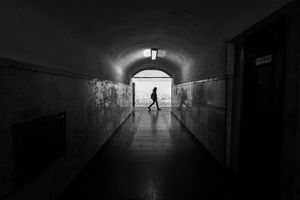 'One of Several Connecting Tunnels Between Opposing Direction Platforms; World's Deepest Metro Station'