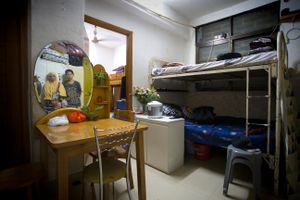 Inside the apartment building in which migrant workers live