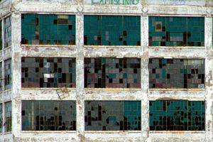 © Nicholas Gregory.     Fisher Body Plant 21 is a massive half million square foot factory that has been abandoned for 30 years. Artists, drug users and scrappers use the building now.