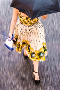 Woman with Umbrella, 42nd Street, NYC, 2016