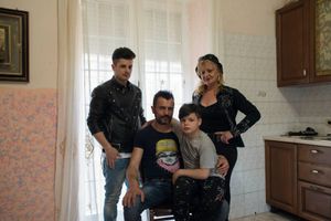The Doria family poses at their home in Casalnuovo. From the left: Ivan Doria, 19, Gianni Doria, 42, Eman Doria, 9 and Maria Doria, Gianni's mother. All of them are singers.