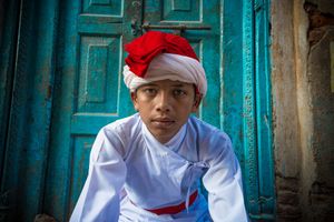 Young member of traditional music band, shortly before Jatra Festival kick off  in Durbar Square in Kathmandu,Nepal.