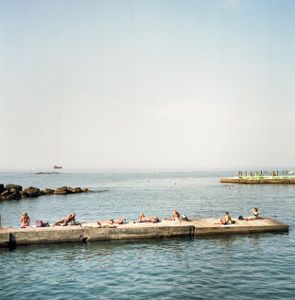 Sunbath on the rocks, Livorno, Italy