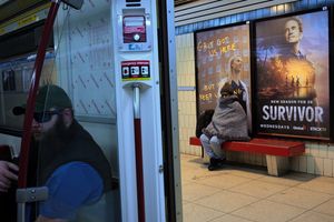 Woman on Subway Platform
