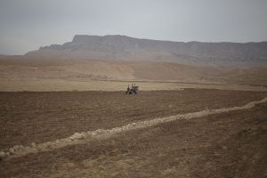 Farmer is plowing the farm