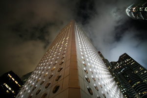Only the silent guardians of the city are shrouded in the darkness of night.