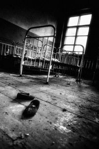 Sleep no more  -  a childs slippers found on the cold floor of an abandoned kinder garten   © Darren Nisbett