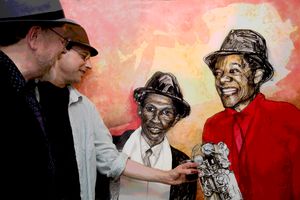 Fragmentary Aura - Bill Warrell and friend at his painting