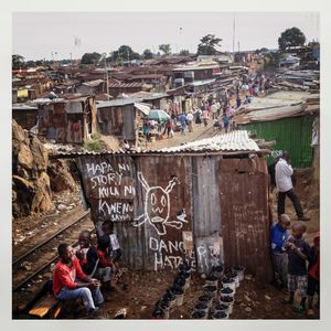 A train track goes through Kibera. The Kibera slum is the largest slum in Nairobi with around half a million inhabitants
