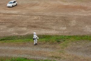 ‘Reclaimed by Nature or Man’, White car and women wearing white