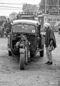 A old man getting into a tuk-tuk | Phagwara, Punjab.