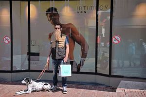 Man Shopping with Dog