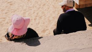 I, my pink hat and the spring beach