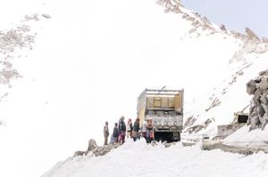 STANDING IN THE SNOW. A STOP DURING THE JOURNEY AT 5,000M