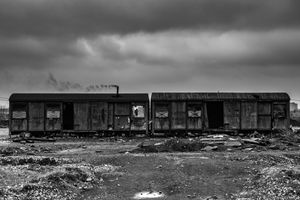 View of the temporary shelter, at the back of main train station. Some of the refugees are living in old railway carriages. Belgrade, Serbia.