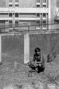 Young man sitting on dirt heap | Phagwara, Punjab.