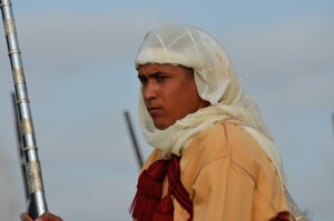 Young fantasia (Tbourida) rider  contemplates the forthcoming charge. Oued Merzeg, Morocco