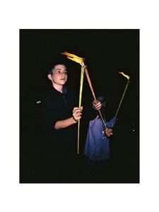 Boy with torches