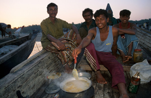 Fish curry dinner on board a fishing boat, St Martin Island, Bangladesh