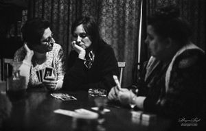 Bridge players discussing a hand