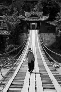 The Luding Bridge, built in 1705, became the official control point for the Qing government, where the yin quota tickets on the tea bales were checked. © Michael Freeman