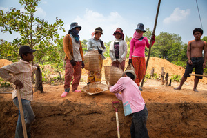 Local villagers work at ADF’s excavation site in Phnom Kulen. Siem Reap Province, Cambodia.
