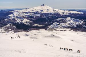Tourists descending Quetrupillán volcano