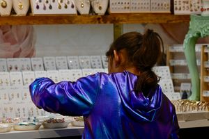 and a little woman in a jewelry store.