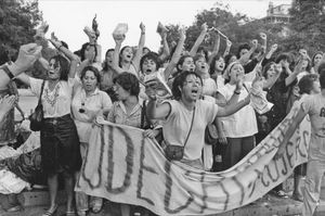 Women soaked by water cannon during a demonstration against Pinochet on International Women's Day. Santiago; Chile, 1985