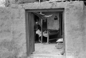 Man Sewing