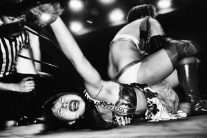 Hibiscus Mii puts Ann Chamu in a single-leg Boston crab.