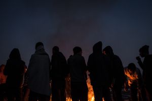 In the evening they gather by the fire, making dinner, drinking tea, and try to get warm as I can because the temperature is below zero.