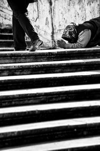 Begging for change at the Spanish Steps in Rome