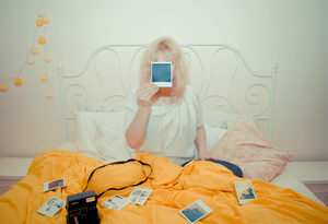 Polaroids in Bed