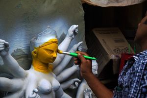 Painting the face.