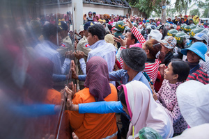 Sabrina Factory workers protest in front of the factory’s gates. The workers had been on strike for weeks demanding a monthly salary increase of US$3.