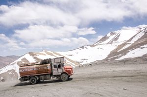 TRUCKS, INSTEAD OF YAKS, ON THE WORLD'S HIGHEST MOTORABLE PASSES