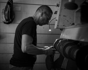 Vito at work buffing a shoe.