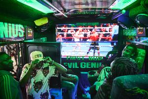 On the LED screens in the Mastermind-Matatu boxing fights are shown while the bus waits for passangers at Tom Mboya Street in Nairobi. Like many matatus, the bus is equipped with colored interior lighting, LED screens and Wifi on board in order entertain the passengers.