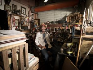 Ken Iron Horse is Apache and Algonquin Indian. He's an artist and makes crafts inspired by his heritage which he sells alongside his paintings at the Blue Ridge Flea Market in Blue Rdige, GA. © Forest McMullin