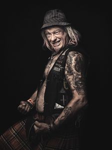 A Biker's World - "Cyclops biker wearing a kilt"