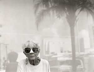 Woman with nose guard, Washington Avenue, Miami Beach, Florida.