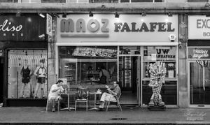 Eating outside Maoz Flalfel