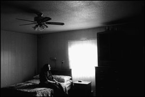 © George Webber - Widow in her bedroom, 2000
