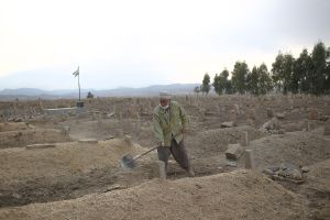 The kooik hassan villagers while arranging the corpse of people who died by earthquake