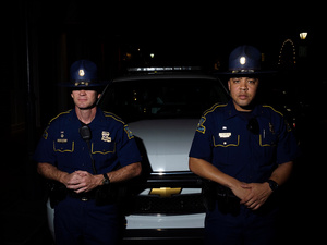 USA. New Orleans. 2015. Cops at night.